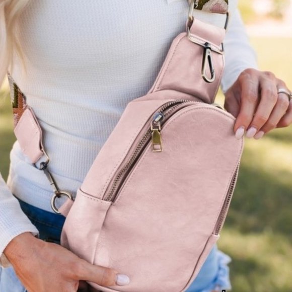 Light Pink, Faux Leather Crossbody Bag with adjustable, embroidered strap. - Picture 1 of 5